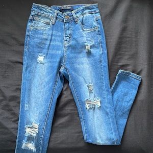 Wax Distressed Skinny Jeans